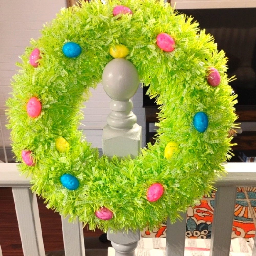 Festive Green Easter Wreath with Colorful Eggs